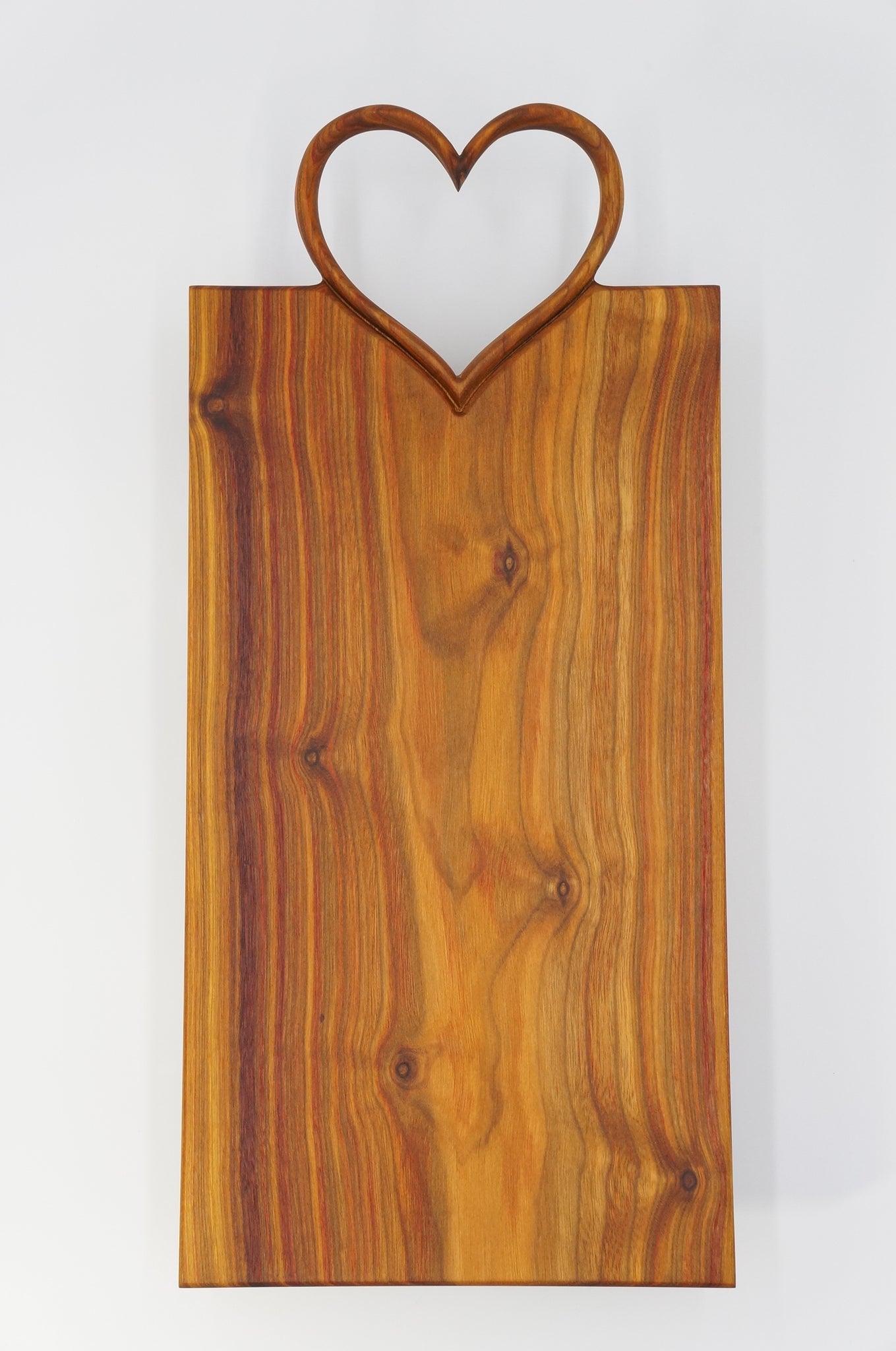 Canary Wood with Heart Handle Cutting Board